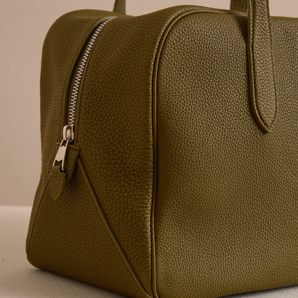 Tumbled grain calfskin