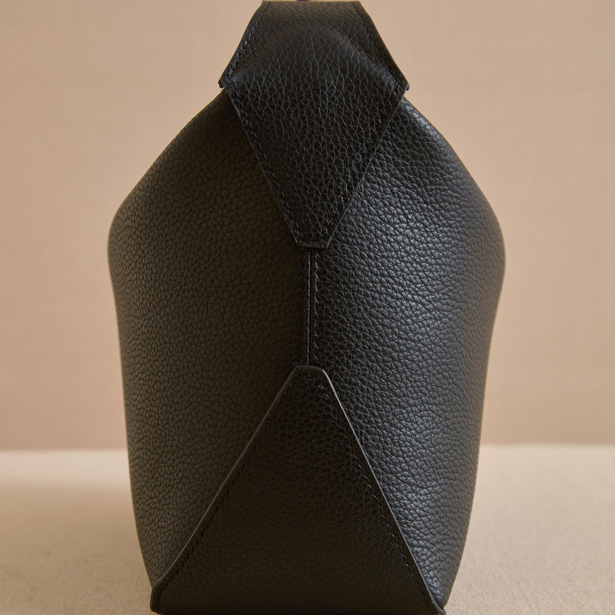 Tumbled grain calfskin